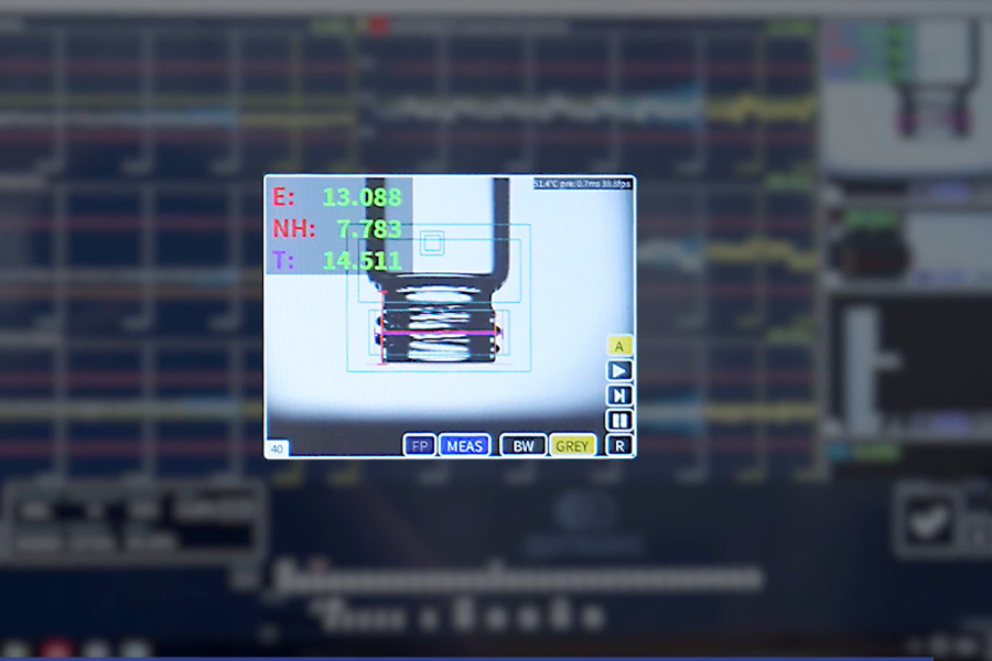Computerized camera inspecting a vial